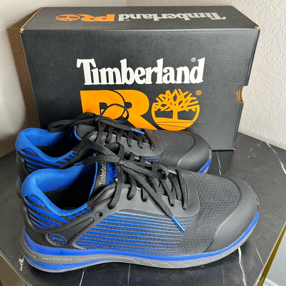 Timberland PRO women’s Black and Blue Steel Toe Lace Up Work
Safety Sneakers 7.5